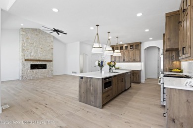 Immerse yourself in the best of Teton Valley living with this on Teton Reserve in Idaho - for sale on GolfHomes.com, golf home, golf lot