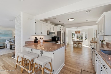 Tucked along a peaceful deep-water canal in the sought-after on Olde Point Golf and Country Club in North Carolina - for sale on GolfHomes.com, golf home, golf lot