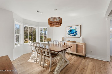 Tucked along a peaceful deep-water canal in the sought-after on Olde Point Golf and Country Club in North Carolina - for sale on GolfHomes.com, golf home, golf lot