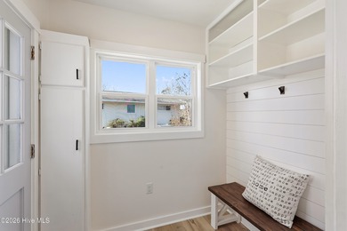 Tucked along a peaceful deep-water canal in the sought-after on Olde Point Golf and Country Club in North Carolina - for sale on GolfHomes.com, golf home, golf lot