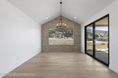 Immerse yourself in the best of Teton Valley living with this on Teton Reserve in Idaho - for sale on GolfHomes.com, golf home, golf lot