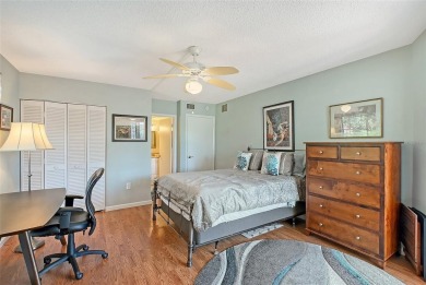 Welcome to Your Lakeside Paradise at 6472 Seagull Terrace #301 on IMG Academies Golf and Country Club in Florida - for sale on GolfHomes.com, golf home, golf lot