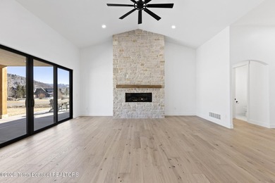 Immerse yourself in the best of Teton Valley living with this on Teton Reserve in Idaho - for sale on GolfHomes.com, golf home, golf lot