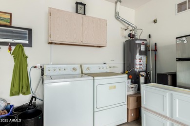 The spacious, open-concept layout seamlessly integrates the on Springfield Golf Resort in Arizona - for sale on GolfHomes.com, golf home, golf lot