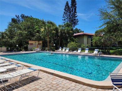 Welcome to Your Lakeside Paradise at 6472 Seagull Terrace #301 on IMG Academies Golf and Country Club in Florida - for sale on GolfHomes.com, golf home, golf lot