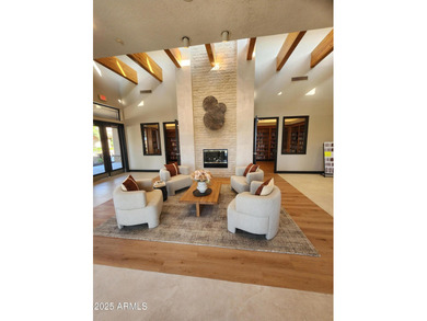 The spacious, open-concept layout seamlessly integrates the on Springfield Golf Resort in Arizona - for sale on GolfHomes.com, golf home, golf lot