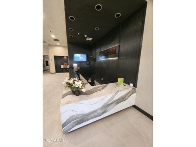 The spacious, open-concept layout seamlessly integrates the on Springfield Golf Resort in Arizona - for sale on GolfHomes.com, golf home, golf lot