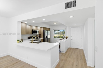 Stunning Lake & Golf Course Views. Fully Renovated Condo in on Flamingo Lakes Country Club in Florida - for sale on GolfHomes.com, golf home, golf lot