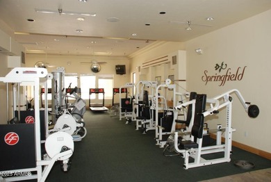 The spacious, open-concept layout seamlessly integrates the on Springfield Golf Resort in Arizona - for sale on GolfHomes.com, golf home, golf lot