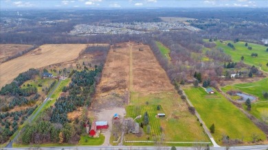 Nestled on 30.2 prime acres with development potential, this on Downing Farms Golf Course in Michigan - for sale on GolfHomes.com, golf home, golf lot