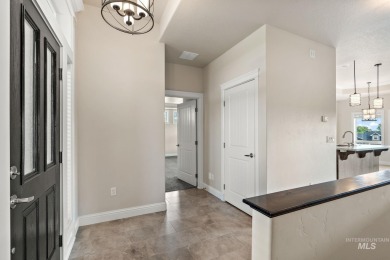Spacious and thoughtfully designed, this 4-bedroom, 3.5-bath on Hunters Point Golf Club in Idaho - for sale on GolfHomes.com, golf home, golf lot