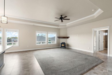 Spacious and thoughtfully designed, this 4-bedroom, 3.5-bath on Hunters Point Golf Club in Idaho - for sale on GolfHomes.com, golf home, golf lot
