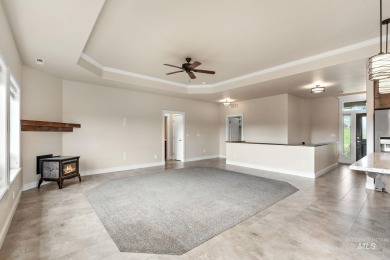 Spacious and thoughtfully designed, this 4-bedroom, 3.5-bath on Hunters Point Golf Club in Idaho - for sale on GolfHomes.com, golf home, golf lot