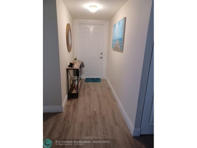 Charming 2 Bedroom /2 Bath Lake View Condominium. Modern kitchen on Sunrise Lakes Phase III in Florida - for sale on GolfHomes.com, golf home, golf lot