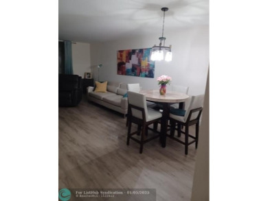 Charming 2 Bedroom /2 Bath Lake View Condominium. Modern kitchen on Sunrise Lakes Phase III in Florida - for sale on GolfHomes.com, golf home, golf lot