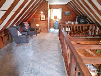 Among the serene wooded pines, this cozy, rustic cabin is a on Terrace Lakes Golf Resort in Idaho - for sale on GolfHomes.com, golf home, golf lot