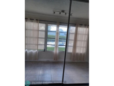 Charming 2 Bedroom /2 Bath Lake View Condominium. Modern kitchen on Sunrise Lakes Phase III in Florida - for sale on GolfHomes.com, golf home, golf lot
