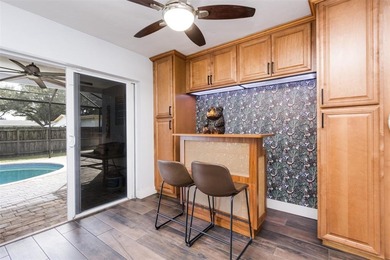 Live your best South Florida life in this charming 3/2 pool home on Cooper Colony Country Club in Florida - for sale on GolfHomes.com, golf home, golf lot