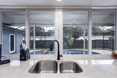 Live your best South Florida life in this charming 3/2 pool home on Cooper Colony Country Club in Florida - for sale on GolfHomes.com, golf home, golf lot