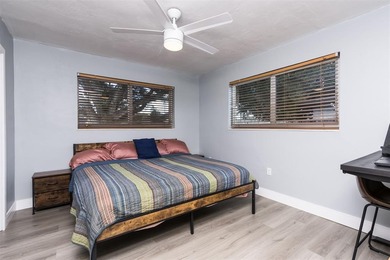 Live your best South Florida life in this charming 3/2 pool home on Cooper Colony Country Club in Florida - for sale on GolfHomes.com, golf home, golf lot