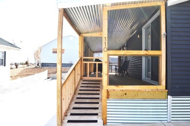 This is a beautifully renovated, from top to bottom, Tiny home on Pointe Royale Village Country Club in Missouri - for sale on GolfHomes.com, golf home, golf lot