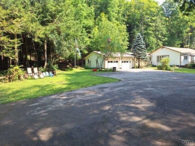 This adorable ranch style home neighbors up to the 18th hole of on Cedar Lake Club in New York - for sale on GolfHomes.com, golf home, golf lot