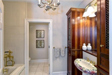 Nestled on a secluded peninsula in the prestigious Ford's Colony on Fords Colony Country Club in Virginia - for sale on GolfHomes.com, golf home, golf lot