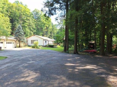 This adorable ranch style home neighbors up to the 18th hole of on Cedar Lake Club in New York - for sale on GolfHomes.com, golf home, golf lot