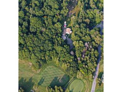 This adorable ranch style home neighbors up to the 18th hole of on Cedar Lake Club in New York - for sale on GolfHomes.com, golf home, golf lot