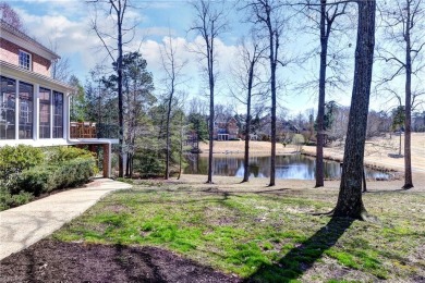 Nestled on a secluded peninsula in the prestigious Ford's Colony on Fords Colony Country Club in Virginia - for sale on GolfHomes.com, golf home, golf lot