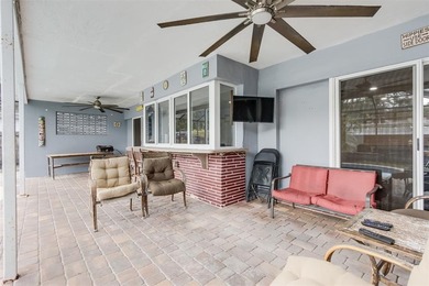 Live your best South Florida life in this charming 3/2 pool home on Cooper Colony Country Club in Florida - for sale on GolfHomes.com, golf home, golf lot