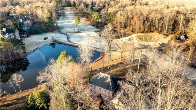 Nestled on a secluded peninsula in the prestigious Ford's Colony on Fords Colony Country Club in Virginia - for sale on GolfHomes.com, golf home, golf lot