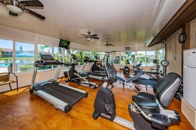 Under contract-accepting backup offers. STUNNING FIRST FLOOR on Gulf Harbors Golf Course in Florida - for sale on GolfHomes.com, golf home, golf lot