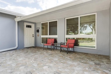 Live your best South Florida life in this charming 3/2 pool home on Cooper Colony Country Club in Florida - for sale on GolfHomes.com, golf home, golf lot