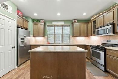 Tastefully upgraded 3-bedroom, 2.5-bath end-unit townhome on Glen Ivy Golf Club in California - for sale on GolfHomes.com, golf home, golf lot