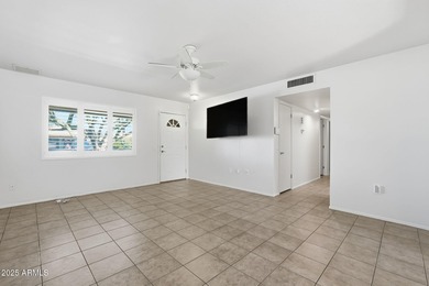 Move-in ready and freshly painted in November, this charming on PalmBrook Country Club in Arizona - for sale on GolfHomes.com, golf home, golf lot