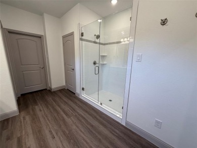 This 4-bedroom, 3-bath home sits on over half an acre on a quiet on Lake Kiowa Golf Course in Texas - for sale on GolfHomes.com, golf home, golf lot