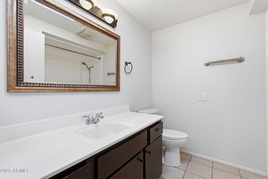 Move-in ready and freshly painted in November, this charming on PalmBrook Country Club in Arizona - for sale on GolfHomes.com, golf home, golf lot