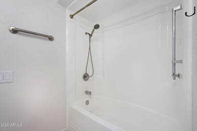 Move-in ready and freshly painted in November, this charming on PalmBrook Country Club in Arizona - for sale on GolfHomes.com, golf home, golf lot