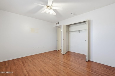 Move-in ready and freshly painted in November, this charming on PalmBrook Country Club in Arizona - for sale on GolfHomes.com, golf home, golf lot