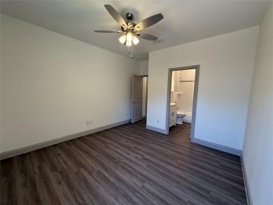 This 4-bedroom, 3-bath home sits on over half an acre on a quiet on Lake Kiowa Golf Course in Texas - for sale on GolfHomes.com, golf home, golf lot