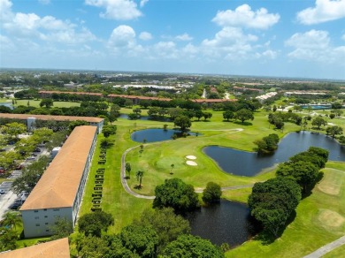 Welcome to your personal paradise in Century Village, a gated on Flamingo Lakes Country Club in Florida - for sale on GolfHomes.com, golf home, golf lot
