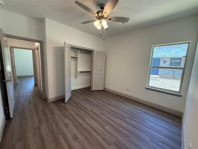 This 4-bedroom, 3-bath home sits on over half an acre on a quiet on Lake Kiowa Golf Course in Texas - for sale on GolfHomes.com, golf home, golf lot