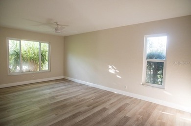 Completely renovated throughout!  This turnkey home is in one of on Highland Lakes Executive Golf Course in Florida - for sale on GolfHomes.com, golf home, golf lot