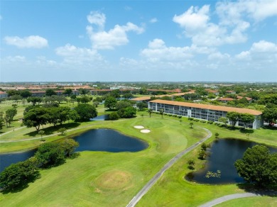 Welcome to your personal paradise in Century Village, a gated on Flamingo Lakes Country Club in Florida - for sale on GolfHomes.com, golf home, golf lot
