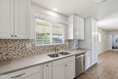 Move-in ready and freshly painted in November, this charming on PalmBrook Country Club in Arizona - for sale on GolfHomes.com, golf home, golf lot