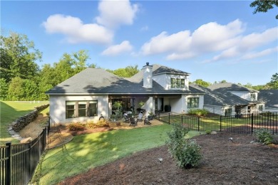 This spacious single-level twin home offers a thoughtfully on The Auburn University Club in Alabama - for sale on GolfHomes.com, golf home, golf lot