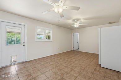 Move-in ready and freshly painted in November, this charming on PalmBrook Country Club in Arizona - for sale on GolfHomes.com, golf home, golf lot