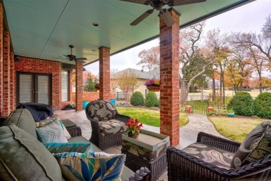 Lovely one level garden home with a view of the 12th fairway at on Oak Tree National Golf and Country Club in Oklahoma - for sale on GolfHomes.com, golf home, golf lot