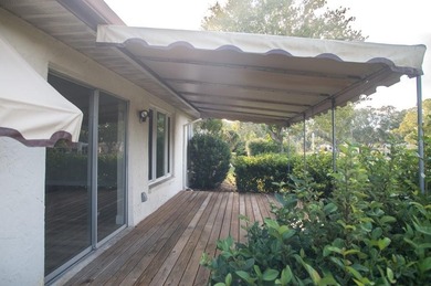 Completely renovated throughout!  This turnkey home is in one of on Highland Lakes Executive Golf Course in Florida - for sale on GolfHomes.com, golf home, golf lot